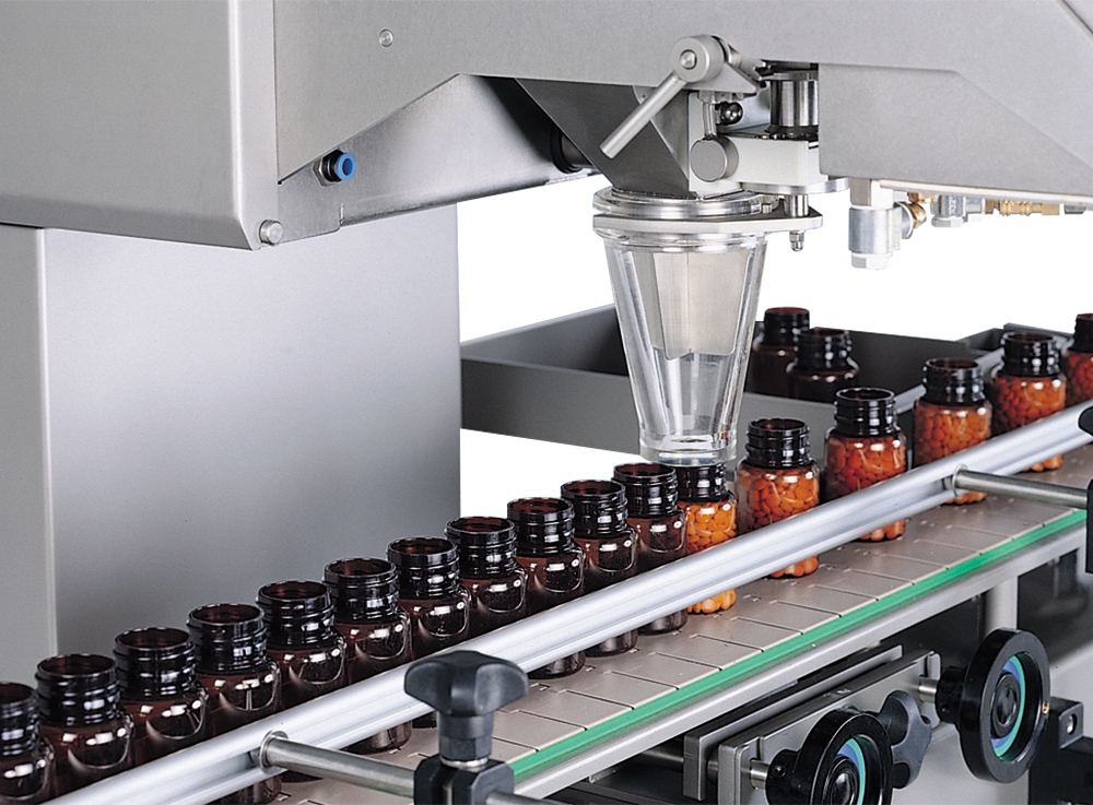 下料高度採電動調整，易於更換不同瓶子高