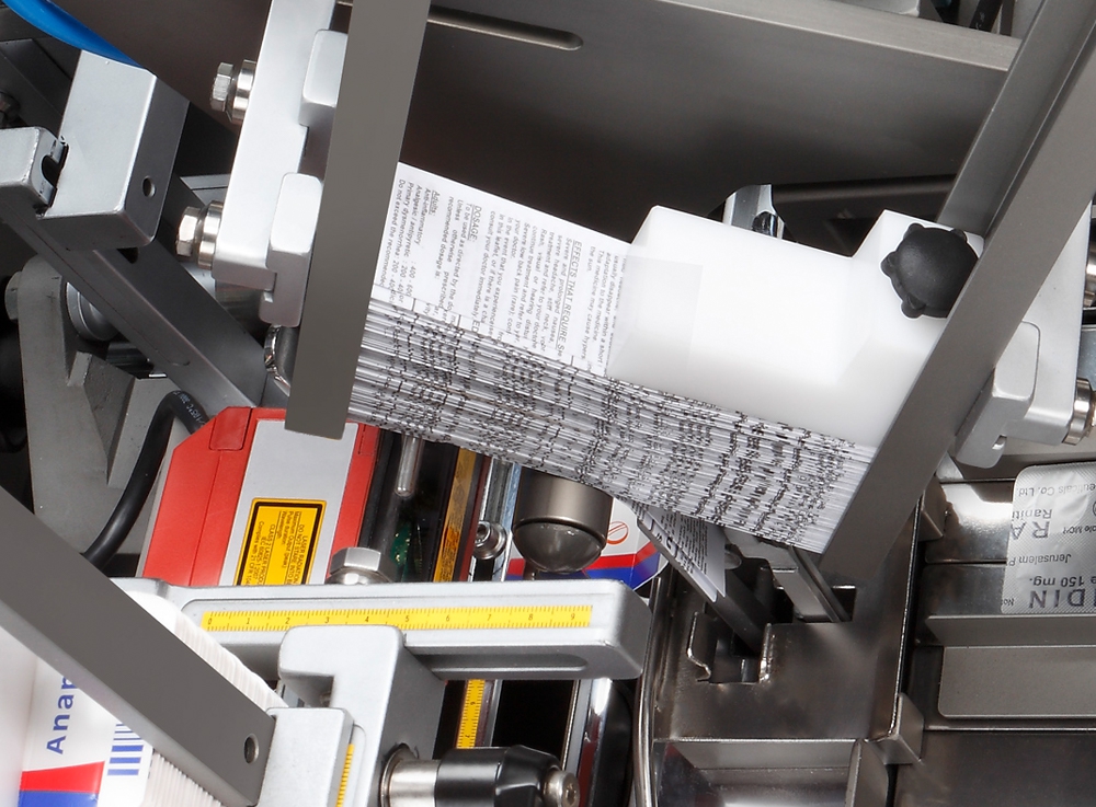 預折說明書塞⼊裝置