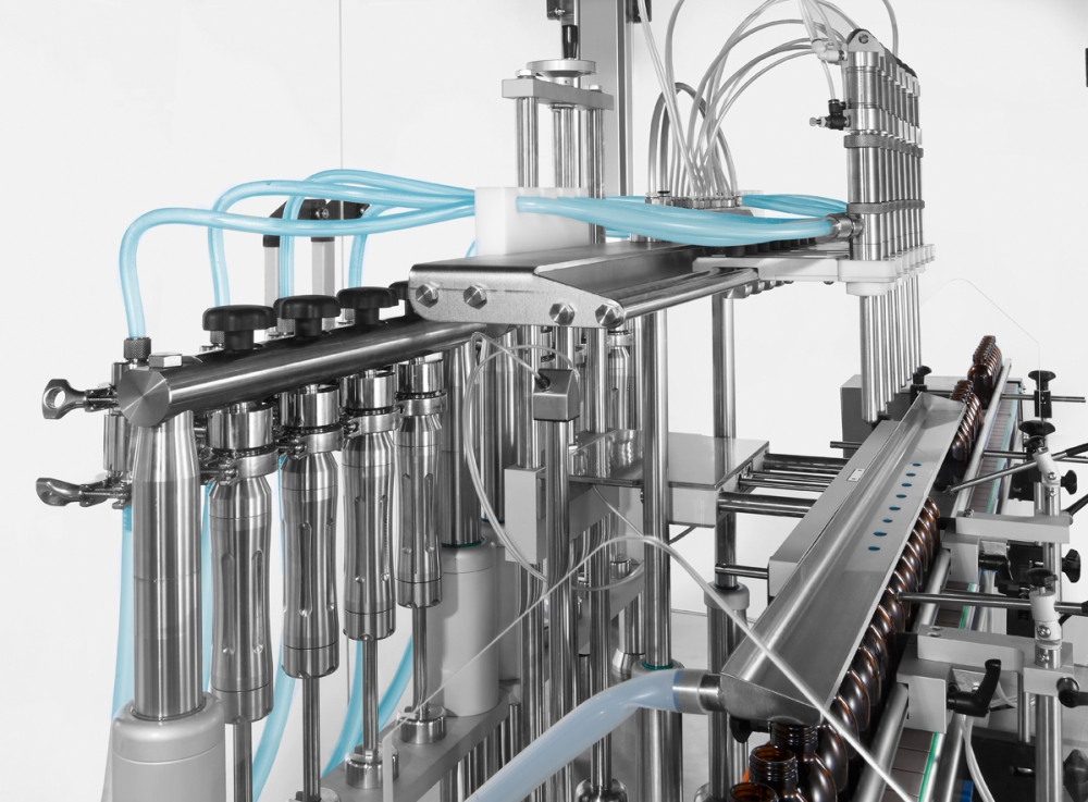 氣閘式充填嘴與防滴漏盤設計:氣閘式充填 嘴建議使用於低黏性液體。